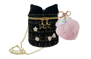 Hot Focus Fashion Bag with Keychain - Good Day
Black textured handbag with gold chain and decorative charms, next to a pink fluffy keychain with star and bow designs.