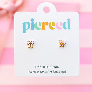 Pierced Co. Pink Bow Earrings
Bow-shaped earrings on a 'pierceed' branded card with a pink gradient background