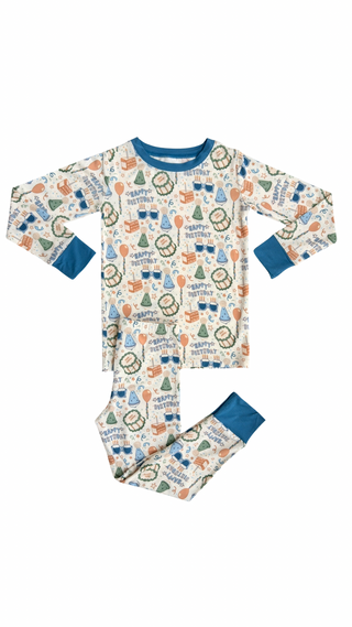 In My Jammers Two Piece Set - Blue Birthday Boy
Children's pajama set with a pattern of animals and text on a white background
