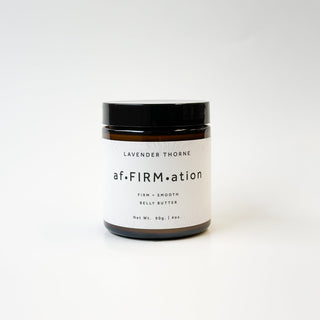 Lavender Thorne Lavender Thorne Affirmation Stretch Mark & Belly Butter moisturizer jar with lavender label and creamy texture.