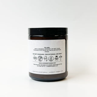 Lavender Thorne Body Polish exfoliating scrub with lavender scent, featuring a jar of moisturizer with a textured surface.