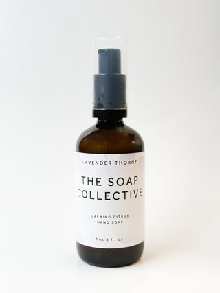 Lavender Thorne Hand Wash soap bottle with lavender and floral design, featuring the Soap Collective branding on the label.