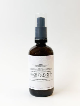 Lavender Thorne hand wash soap in a clear pump bottle with lavender and floral design, showcasing the product label and packaging.