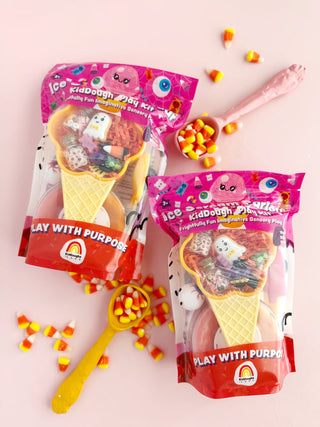 EGKD Ice Scream Parlour KidDough Play Kit
Two packages of ice cream cone-shaped kidough play kits with candy on a pink background