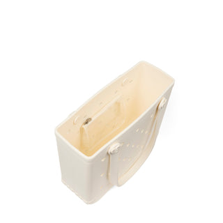 In Love BABY BOGG BAG Coconut
An off-white plastic organizer insert or pouch with a handle and ventilation holes, shown from an elevated angle on a white background.