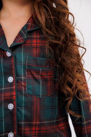 In My Jammers girl's ruffle flare 2-piece pajama set with holiday heritage plaid, featuring ruffle details and cozy fabric.