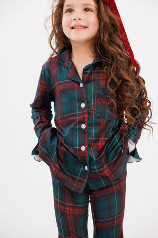 In My Jammers girl's ruffle flare 2-piece pajamas set in holiday heritage plaid featuring a cozy top and matching pants.