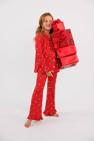 In My Jammers girl's ruffle flare 2-piece pajama set in ruby polka dot with ruffle details, shown on a girl mannequin.