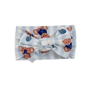 In My Jammers Hanukkah Bears Headband
Headband with teddy bear design on a white background