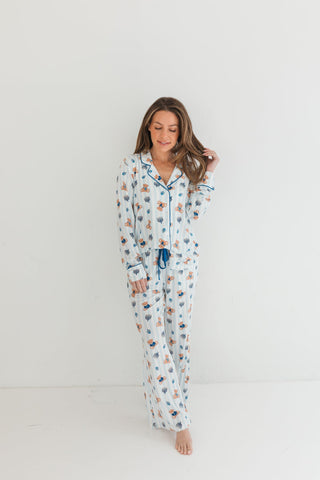 In My Jammers Hanukkah Bears Women's Set
Woman wearing a floral onesie against a white background