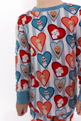 In My Jammers Two Piece Set - Blue Fur-Ever Valentine
Children's pajama top with heart and dog pattern on a white background
