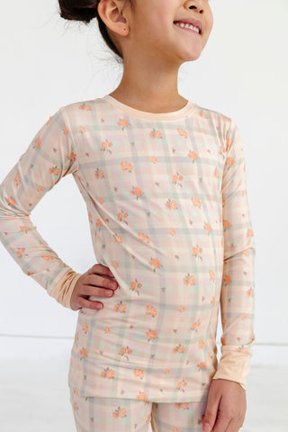 In My Jammers Two Piece Set - Frankie Plaid
Child wearing a long-sleeve pajama set with a floral pattern on a white background