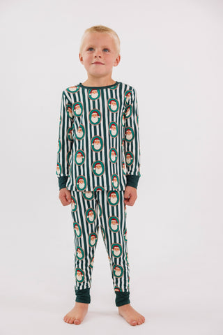 In My Jammers green Santa Claus Lane two-piece pajama set with festive holiday print, featuring a long-sleeve top and matching pants.