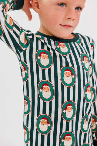 Green Santa Claus Lane two-piece pajama set by In My Jammers, featuring festive holiday-themed pajamas for kids.