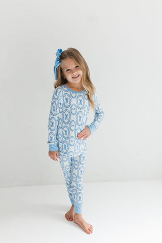 In My Jammers Two Piece Set - Julia Bow
Child wearing a blue patterned onesie on a white background