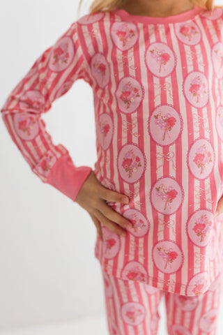 In My Jammers Two Piece Set - Pink Blaire
Pink pajama set with floral patterns on a white background