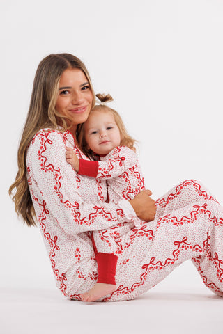 In My Jammers women's long sleeve pajama set with vintage bows and blossoms, featuring ruffle details and button-up design.