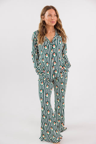 Women’s green Santa Claus Lane long sleeve ruffle pajamas set by In My Jammers, featuring festive holiday pajamas with ruffle details.