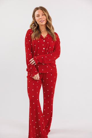 In My Jammers women's long sleeve ruffle pajamas set in ruby polka dot, featuring a cozy, stylish design with ruffle details.