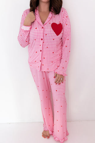 In My Jammers Women's Long Sleeve Set - Be Mine Gingham
Pink checkered pajama set with a red heart on a white background