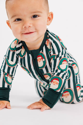 In My Jammers green Santa Claus Lane zipper romper pajamas for kids, featuring festive holiday design and comfortable fit.