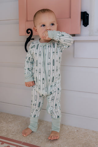 In My Jammers green zipper romper pajamas with surf-themed design, comfortable sleepwear for kids, front zipper closure.