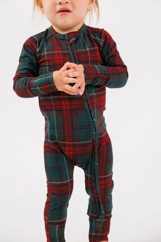 In My Jammers zipper romper pajamas in holiday heritage plaid fabric, featuring a front zipper and cozy design.