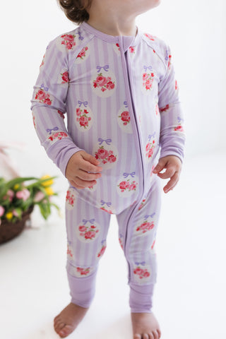 In My Jammers Zipper Romper - Petal Pop
Child wearing a floral onesie with a zipper on a white background