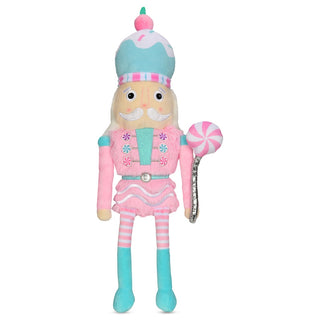 Iscream Candy Nutcracker Plush
Plush toy resembling a character in a pink and blue outfit with a candy cane on a white background