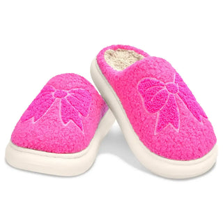 Iscream Cozy Bows Pink Slippers
Pair of pink slippers with a bow design on a white background