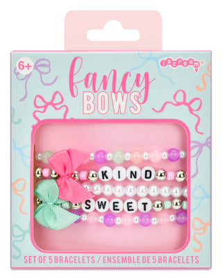Iscream Fancy Bows Bracelet Set
Packaged set of 5 bracelets with decorative bows and letters on a light blue background