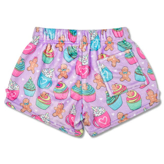 Iscream Gingerbread Cafe Plush Shorts
Shorts with a colorful pattern of cupcakes and gingerbread men on a purple background