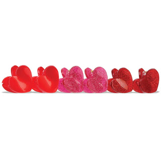 Iscream Heart Hair Clips Set
Heart-shaped candy pieces in red and pink on a white background