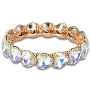 Iscream Iridescent Heart Bracelet
Gold ring with clear gemstones on a white background