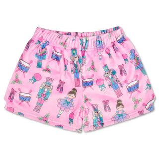 Iscream Nutcracker Waltz Plush Shorts
Pink shorts with colorful nutcracker pattern on a white background