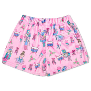 Iscream Nutcracker Waltz Plush Shorts
Pink shorts with colorful patterns on a white background