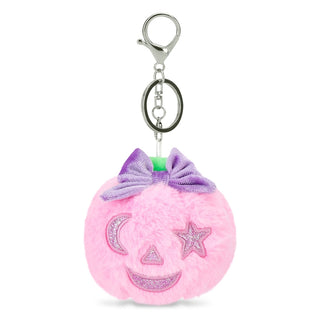 Iscream Pumpkin Bag Charm
A pink plush jack-o'-lantern keychain charm with embroidered moon and star eyes, a glittery smile, a purple bow, and a silver metal clasp on a white background.