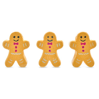 Iscream Sugar And Spice Bath Bomb Set
Three small gingerbread person figurines in a warm tan-orange color, decorated with pink bow ties and buttons, black eyes and mouths, and white line details, arranged on a plain white background.