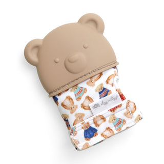 Itzy Ritzy Teething Mitt - Vintage Bear
Teddy bear-shaped pouch with a patterned interior on a white background