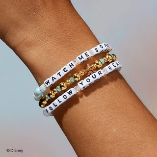 Little Words Project Bracelet - Disney Princess: Jasmine
Two bracelets with motivational phrases on a wrist, featuring Disney branding.