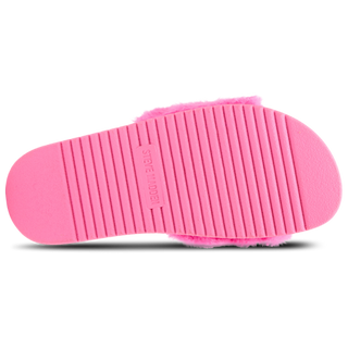 Steve Madden Kid's Dumbo - Hot Pink
A bright pink slide sandal shown from the sole view, featuring a textured ridged rubber outsole with the brand name 'STOCK WOODEN' embossed in the center, and fluffy pink faux-fur trim visible at the top and side, set against a plain white background.
