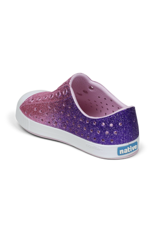 Native Jefferson Bio-Bling™ - Parachute Glamour Bling / Shell White
Purple glittery shoe with white sole on a white background