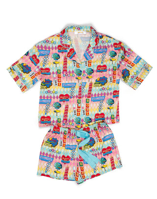 Kids' Sunshine Society silky short sleeve pajama set featuring vibrant highway holiday print, perfect for comfortable sleepwear.