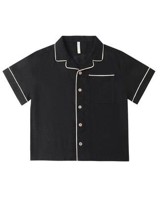 Black Rylee & Cru lapel collar shirt displayed flat, showcasing the classic collar and clean design.