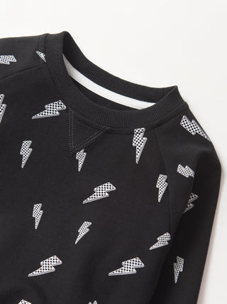 Little Bipsy Lightning Bolt Pullover - Black
Black sweatshirt with white lightning bolt patterns on a white background