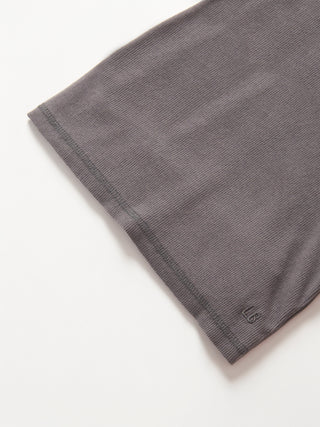 Little Bipsy Long Sleeve Ribbed Tee - Graphite
Gray fabric with a subtle pattern on a white background