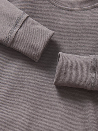Little Bipsy Long Sleeve Ribbed Tee - Graphite 
Close-up of a gray sweatshirt with rolled-up sleeves.