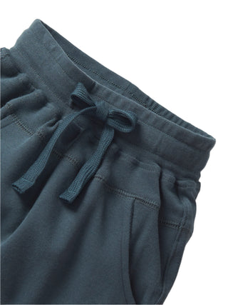 Little Bipsy Jogger - Night Fall 
Blue sweatpants with drawstring on a white background