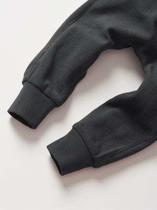 Little Bipsy Waffle Jogger - Shadow
Black sweatshirt on a light gray background