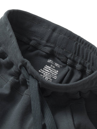 Little Bipsy Jogger - Shadow
Close-up of a black hoodie with 'Little Bipsy' label on a light gray background